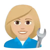 a woman in a blue shirt holds a wrench