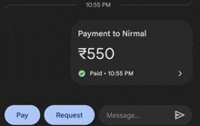 a phone screen shows a payment to nirmal of 550