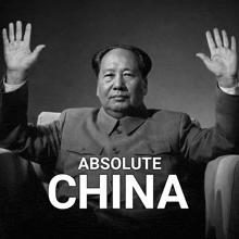 a black and white photo of a man with his hands in the air and the words absolute china behind him