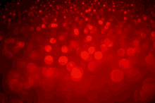 a blurred image of red lights on a red background