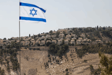 a blue and white flag with a star of david in the middle