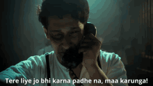 a man is talking on a phone with the words " tere liye jo bhi karna padhe na maa karunga " written below him