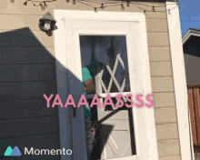 a picture of a door with the words yaaaa asss written on it