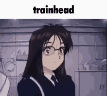 a picture of a girl with glasses and the word trainhead on the bottom