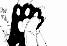 a black and white drawing of a cat paw on a person 's foot .