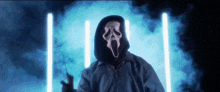 a person wearing a scream mask holds a knife