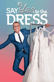 a man in a suit and tie is holding a hanger of wedding dresses with the words say yes to the dress behind him