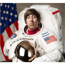 a man in a space suit with the name howard wolowitz on the front