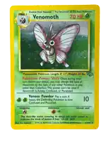 a pokemon card with a pink and white butterfly on it