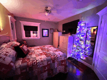 a bedroom decorated for christmas with a bed and a tree