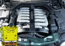 a spongebob character stands in front of a mercedes engine