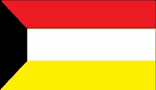 a red , white , and yellow flag with a black triangle in the middle on a white background .