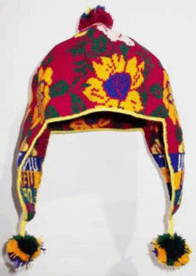 a colorful hat with a flower on it