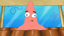 patrick star from spongebob squarepants is sitting in a chair