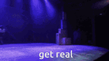 a pixelated image of a stage with the words get real on it