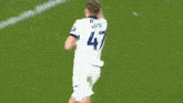 a soccer player with the name helik on his jersey