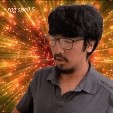 a man with glasses and a beard is standing in front of a glowing background with the words rpg spell 5 on it