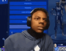 a man wearing headphones says " ohio denial " while playing a video game