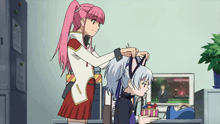 a girl with pink hair is putting a bunny ear hat on another girl