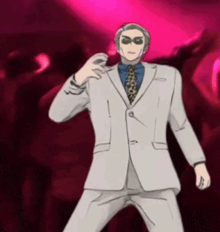 a man in a suit and tie is dancing in front of a crowd in a club .