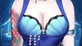 a close up of a woman 's breasts in a blue top