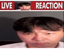 a man 's face is shown in front of a live reaction banner