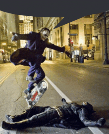 the joker is riding a skateboard over batman