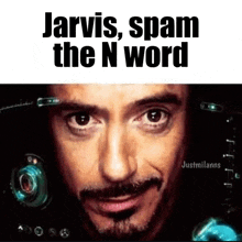 a close up of a man 's face with the words jarvis spam the n word