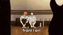 a couple of anime characters sitting on the floor with the words frani i ari written on the floor .