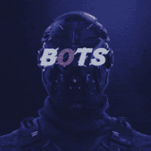 a person wearing a helmet with the word bots written on it