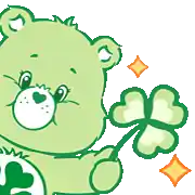a green care bear holding a green clover