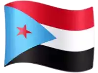 a red white and black flag with a blue triangle and a red star