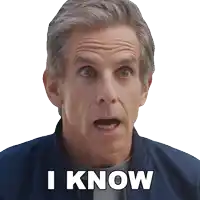 a man with a surprised look on his face says " i know " in white letters