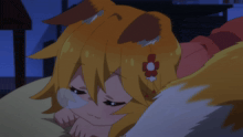a cartoon character with a flower in her hair is laying down