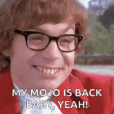 a man wearing glasses and a red jacket says my mojo is back baby yeah !
