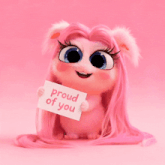 a pink stuffed animal is holding a card that says proud of you