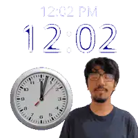 a man wearing glasses stands next to a clock that says 12:02 pm