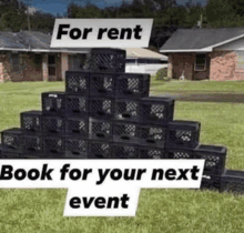 a pyramid made out of milk crates with the words for rent and book for your next event