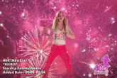 a woman is dancing in front of a fireworks display that says starship entertainment added date 2000-01-26