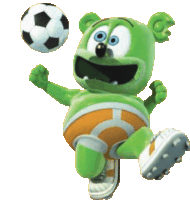 a green gummy bear is kicking a soccer ball in the air