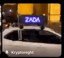 a video of a car with a zada sign on top of it