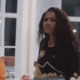 a woman wearing a black shirt that says reebok