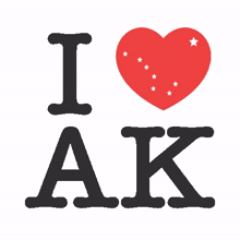 a sign that says " i love ak " with a red heart