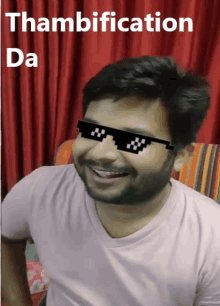 a man wearing sunglasses with the words thambification da on it