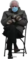 a man wearing mittens and a mask sits on a chair