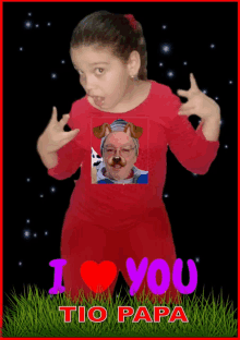 a little girl wearing a red shirt that says i love you