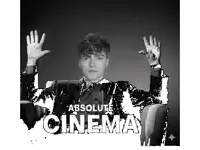 a man is sitting in a chair with his hands in the air and the words " absolute cinema " behind him