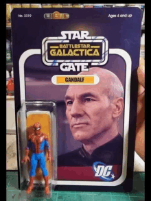 a star wars battlestar galactica gate gandalf action figure is being held in someone 's hand