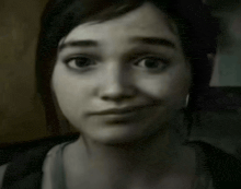 a close up of a woman 's face with a serious expression