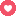 a pink circle with a heart in the middle of it .